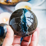 1 UV-reactive volcanic agate ball - luminescent green fluorescent crystal with clusters, volcanic stone home decor