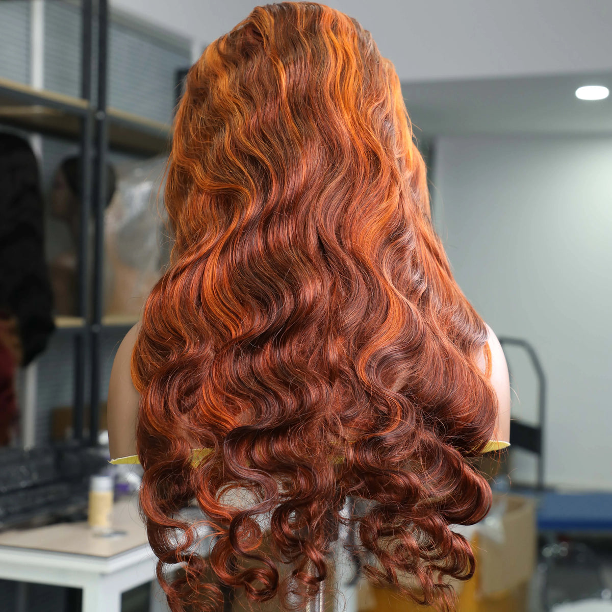 Water wave human hair wig with lace frontal in ginger orange-brown, featuring 13x6 HD lace and pre-plucked hairline