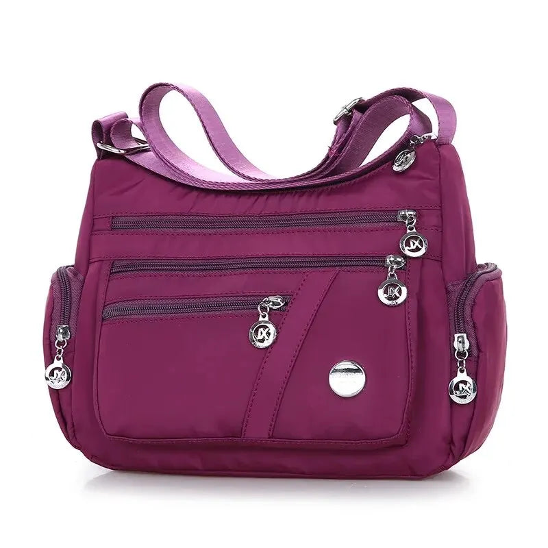 Women nylon waterproof messenger handbag by HSF Marketplace, large capacity casual crossbody bag for travel and everyday use.