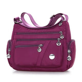 Women nylon waterproof messenger handbag by HSF Marketplace, large capacity casual crossbody bag for travel and everyday use.