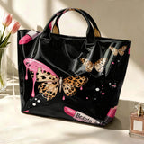 Leopard print tote handbag for women with pink lipstick and butterfly design, large capacity gothic style street trend bag.