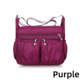 Women nylon waterproof messenger handbag by HSF Marketplace, large capacity crossbody bag for travel and casual use.
