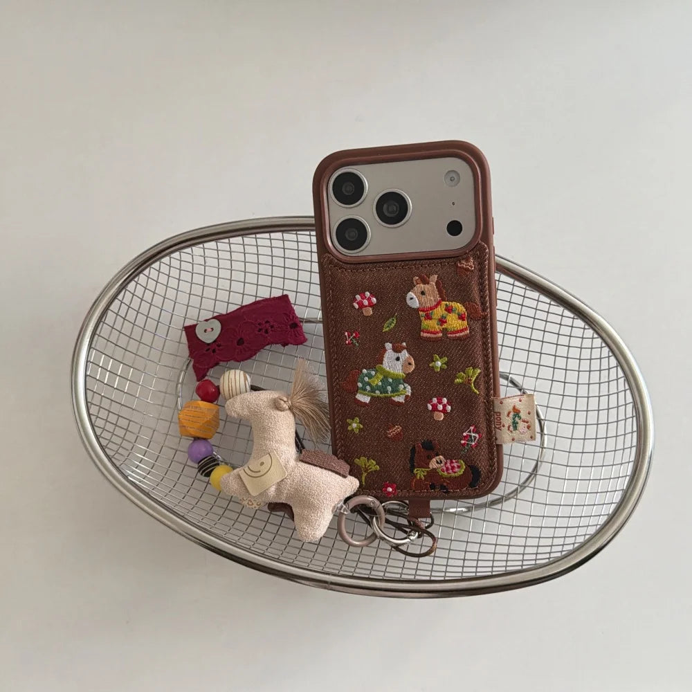Embroidered Three Ponies phone case for iPhone 17 and 16 Pro by HSF Marketplace