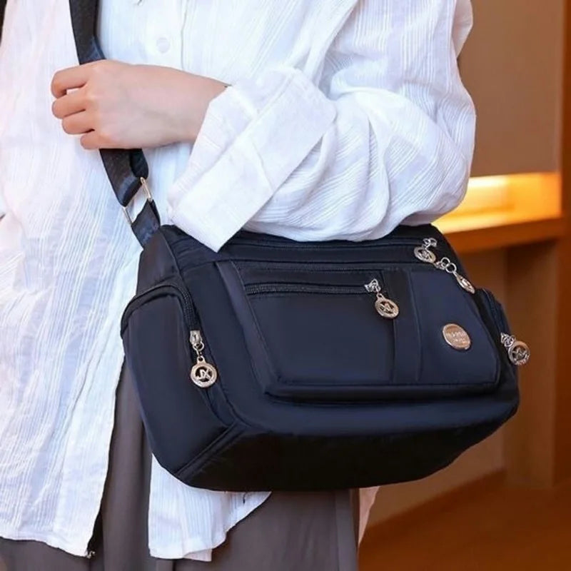 Women nylon waterproof messenger handbag by HSF Marketplace, featuring a large capacity, casual crossbody design, and high-quality construction.