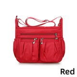 Women's nylon waterproof messenger bag by HSF Marketplace, large capacity casual crossbody shoulder handbag for travel and daily use.