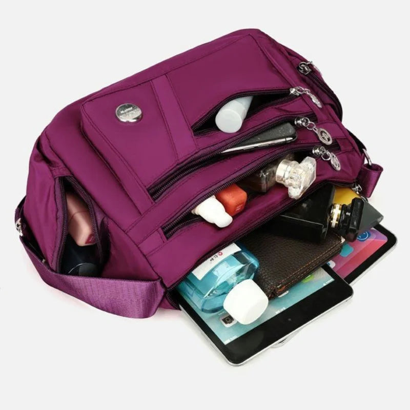 Women’s nylon waterproof messenger bag by HSF Marketplace, large capacity casual crossbody handbag with shoulder strap.