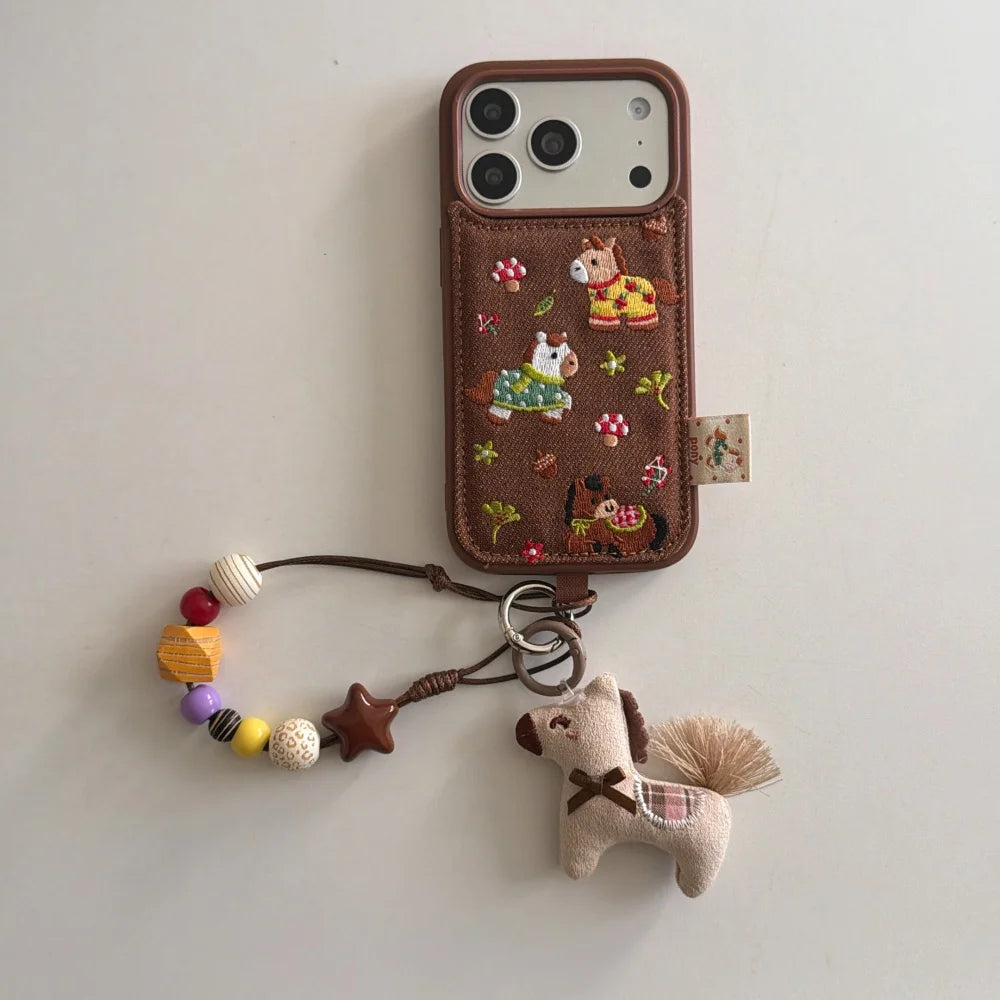 Embroidered Three Ponies phone case for iPhone 17 and 16 Pro by HSF Marketplace
