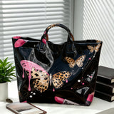 Leopard print tote handbag with pink lipstick and butterfly design, large capacity, gothic style, perfect for daily use.