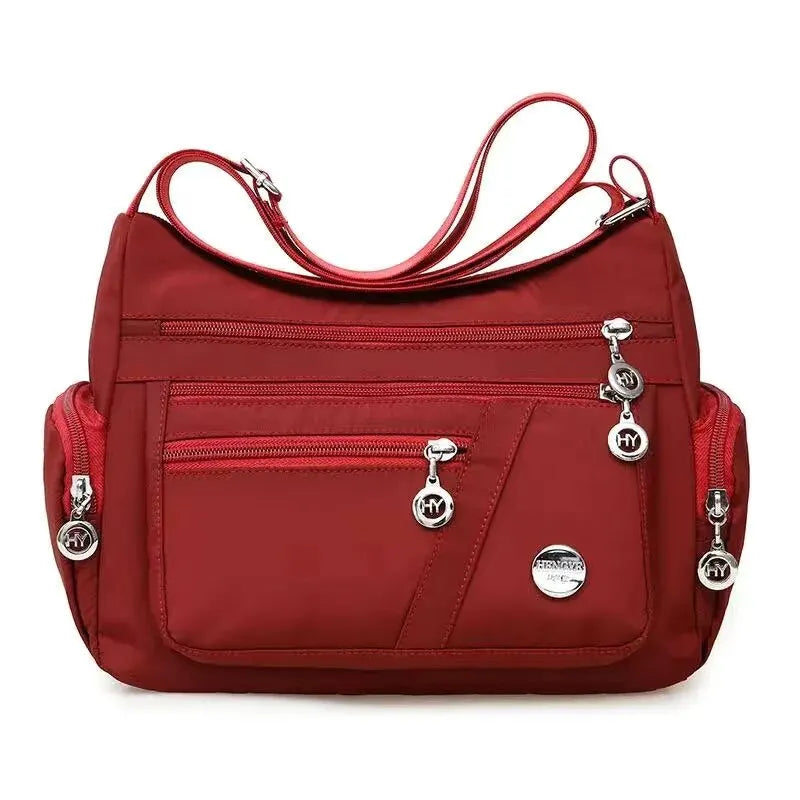 Women nylon waterproof messenger bag by HSF Marketplace, large capacity crossbody travel shoulder handbag with casual style.