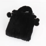 Genuine mink fur messenger shoulder bag for women, high-quality real fur handbag with top handle and cross-body strap.