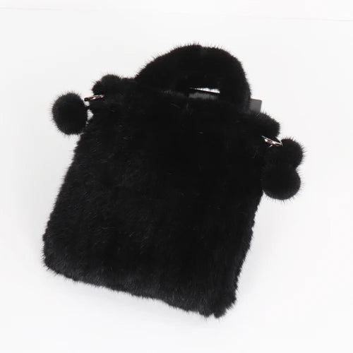 Genuine mink fur messenger shoulder bag for women, high-quality real fur handbag with top handle and cross-body strap.