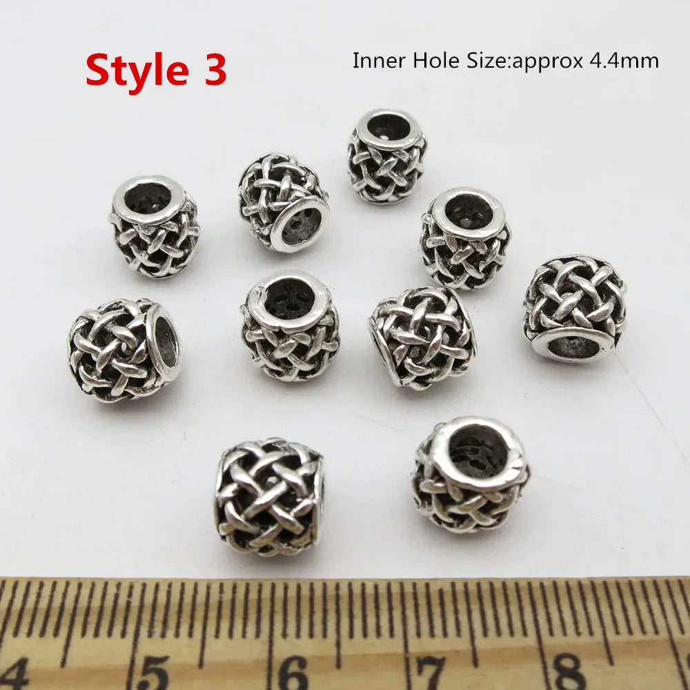 Silver Viking rune hair braid beads for dreadlocks and beards close-up