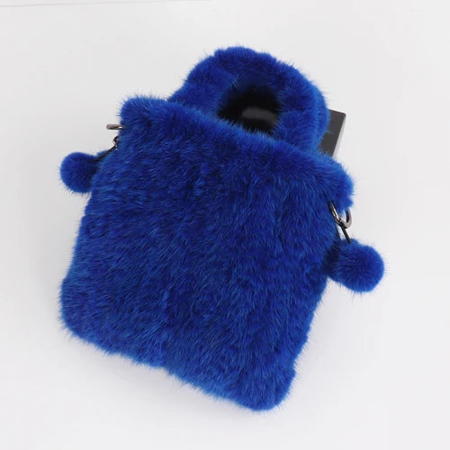 Genuine mink fur handbag by HSF Marketplace featuring a cross-body style, top handle, and elegant ladies shoulder purse.