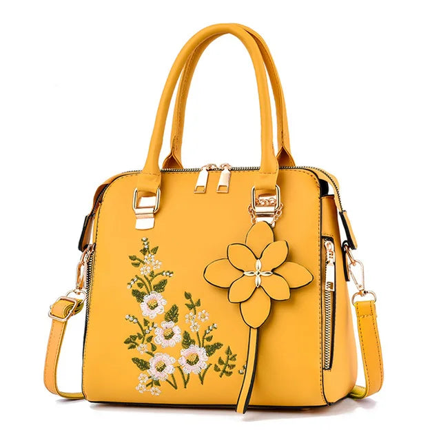 Luxury embroidery handbag for women with PU leather, tassel detail, designer handle, crossbody style, HSF Marketplace brand.