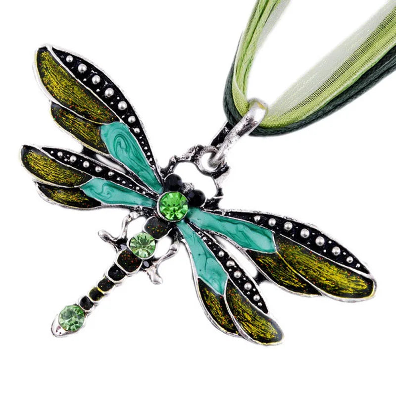 Elegant pendant necklace featuring a crystal dragonfly charm on ribbon, designed for women, by HSF Marketplace.