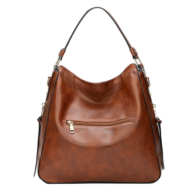 Leather hobo bag for women with spacious interior, casual shoulder style, vintage look, from HSF Marketplace, perfect for everyday use.