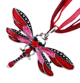 Silver pendant necklace featuring a crystal dragonfly design on a ribbon chain, perfect for women’s casual jewelry.