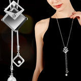 Elegant geometric crystal pendant necklace for women featuring pearls, fashionable long choker jewelry with statement design.