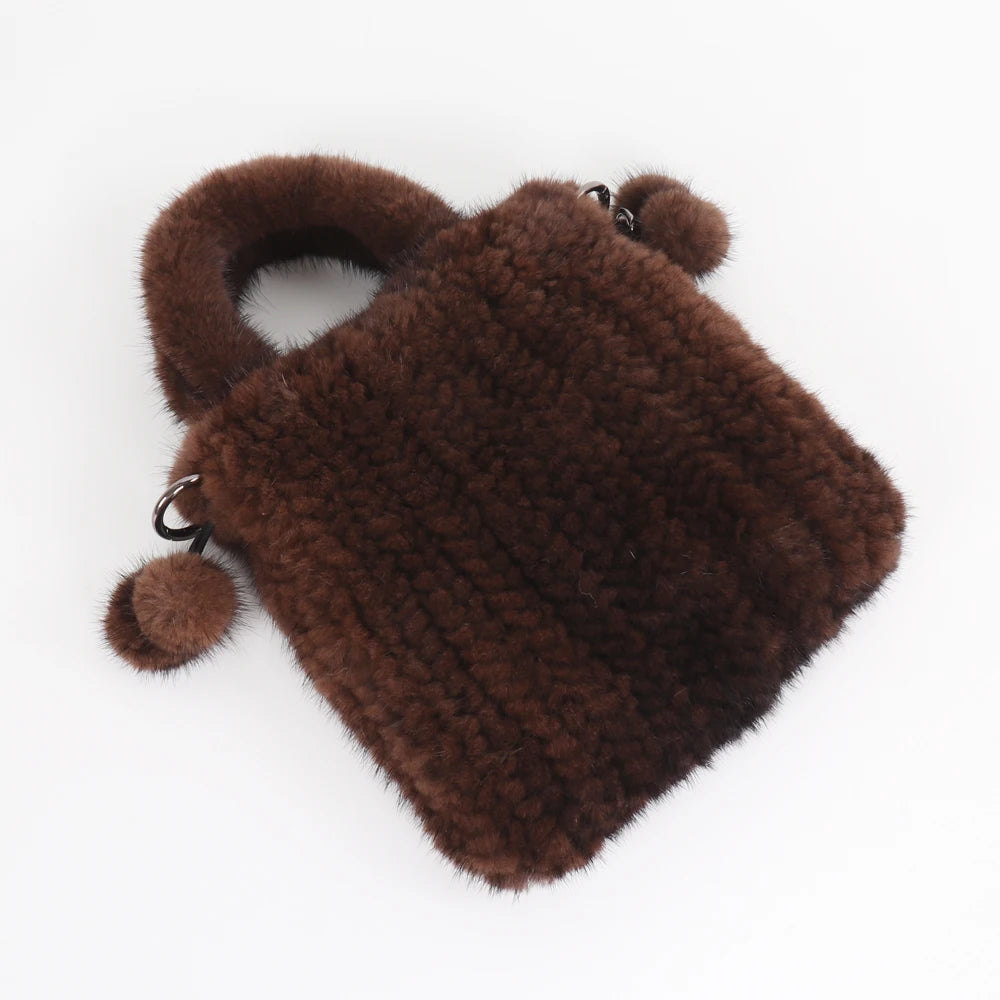 Genuine mink fur messenger shoulder handbag for women with top handle and cross-body strap, stylish and high-quality fur purse.