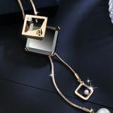 Long geometric crystal pendant necklace for women, featuring a stylish pearl choker design with elegant jewelry craftsmanship.