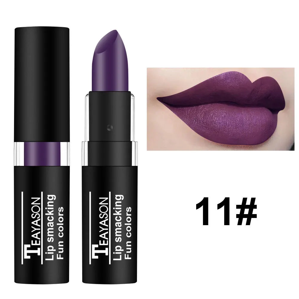 Assorted waterproof lipstick shades including black, blue, purple, green, and red with matte finish, displayed in a makeup set.