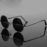 Retro vintage round polarized sunglasses for men and women with black lenses, alloy metal frame, UV400 protection, stylish designer eyewear