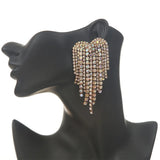 Heart chandelier earrings with sparkling rhinestones in a trendy dangling jewelry design