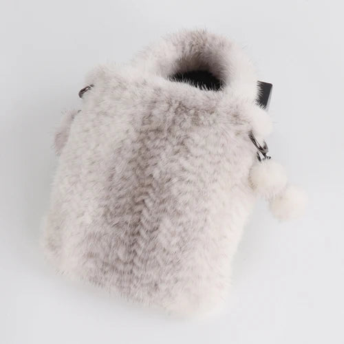 Genuine mink fur handbag by HSF Marketplace, stylish cross-body and top-handle purse for women with luxurious soft fur texture.