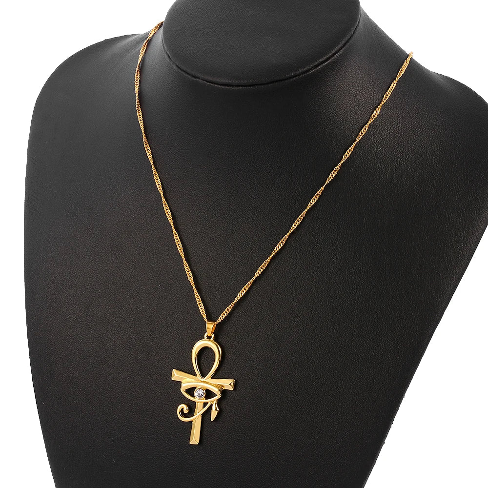 Gold Eye of Horus Egypt charm pendant with Ankh cross design, featuring a religious jewelry necklace for women.