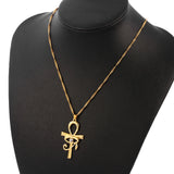 Gold Eye of Horus Egypt charm pendant with Ankh cross design, featuring a religious jewelry necklace for women.