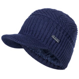 Women's fur-lined winter beanie hat with brim, soft thick knitted design in a stylish unisex fit