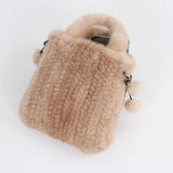 Genuine mink fur handbag by HSF Marketplace featuring a shoulder strap and top handle, high-quality luxurious women’s cross-body bag