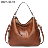 Leather hobo bag by HSF Marketplace featuring a large capacity tote with shoulder strap, vintage style for women.