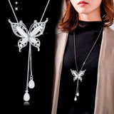 Elegant geometric crystal pendant necklace for women, featuring pearls and a statement design, ideal for fashionable jewelry looks.