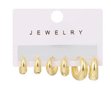 Minimalist stainless steel huggie hoop earrings for women by HSF Marketplace