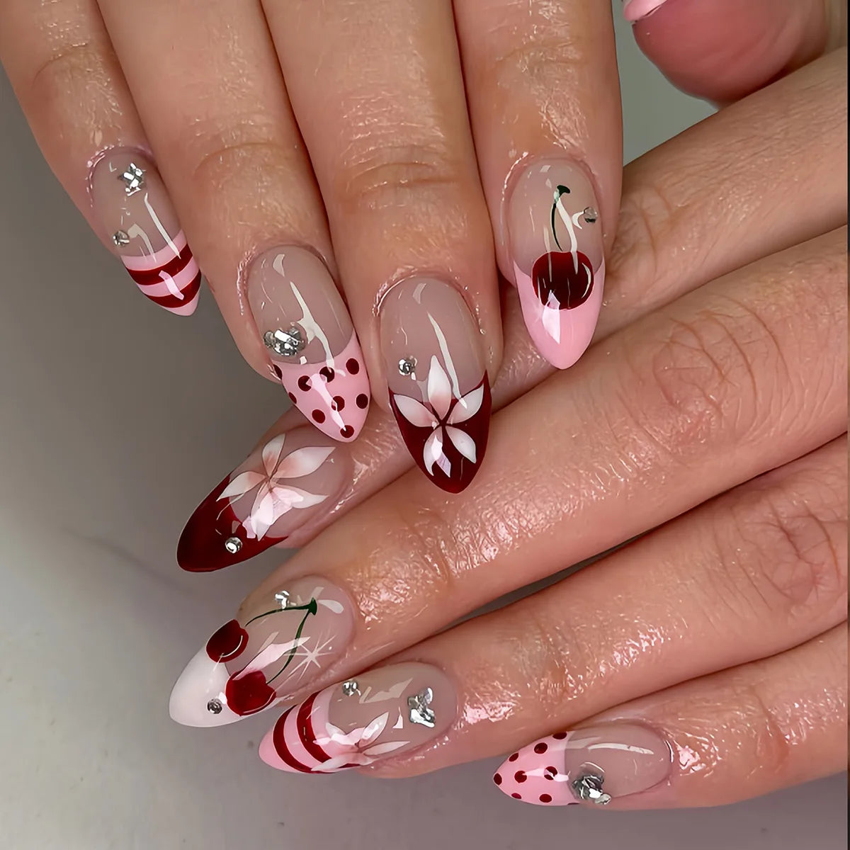 24-piece almond shape false nails with brown stripes and pink flowers, wearable full-cover acrylic nail tips