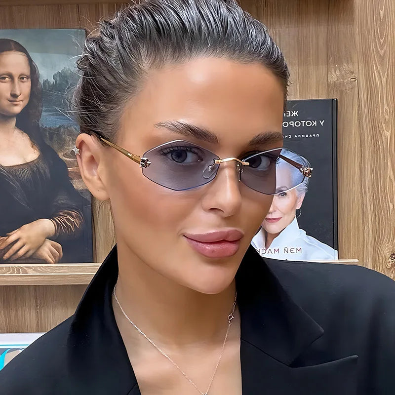 Elegant frameless rhombus-shaped women's sunglasses by HSF Marketplace with UV400 protection and a versatile classic design.