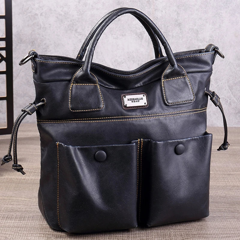 Vintage faux leather tote bag for women and men, brown and navy luxury handbag with spacious design and stylish handles.