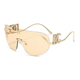 Luxury oversized shield sunglasses by HSF Marketplace with gold metal frames and gradient UV400 protection sunglasses.