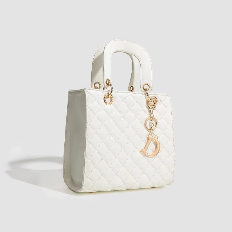 Luxury PU leather casual crossbody handbag for women, large capacity designer tote with shoulder strap, ideal for travel and everyday use.
