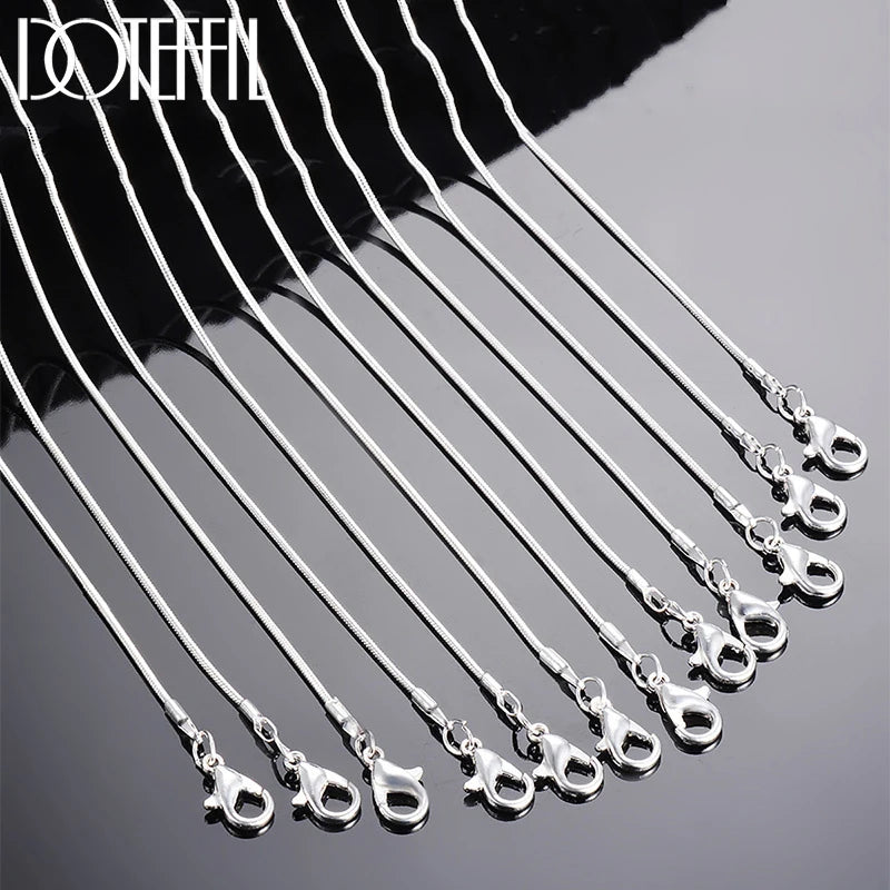 Sterling silver snake chain necklace in various lengths, 1.2mm thickness, for women and men, showcasing a shiny, smooth jewelry design.