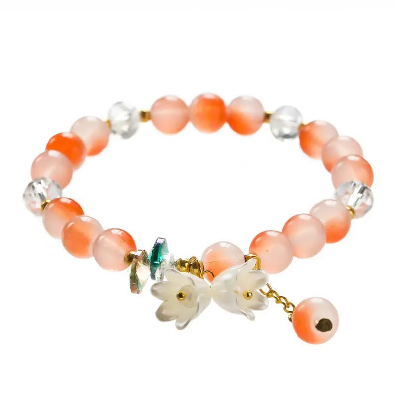 Colorful Lily Valley flower bracelet for women featuring crystal beads, elastic design, perfect for weddings and birthdays.