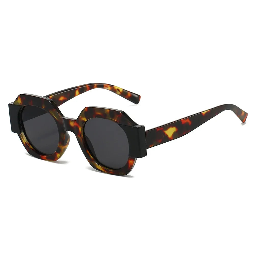 Hexagon-shaped designer sunglasses for women with colorful patchwork pattern, casual retro shades by HSF Marketplace.