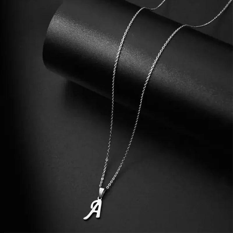 Glossy stainless steel initial letter pendant necklace for women, featuring a simple clavicle chain choker jewelry style.
