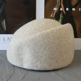 Women's warm wool blend winter beret hat in an elegant style by HSF Marketplace