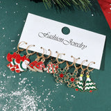 Festive Christmas dangle earrings by HSF Marketplace featuring snowman and elk charms