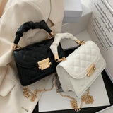Luxury black PU leather shoulder handbag for women, small underarm purse with elegant design and compact size.