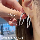 Elegant silver hoop earrings with CZ stones for women, versatile jewelry by HSF Marketplace