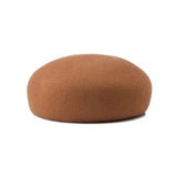 Women’s wool felt beret hat by HSF Marketplace with vintage hard concave top, styled as a wedding fascinator pillbox cap