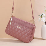 Elegant black PU leather crossbody handbag with embroidery thread detail, zipper closure, and spacious interior for women.